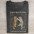 Gesundheit der Bevölkerung über Unternehmensgewinn T-Shirt